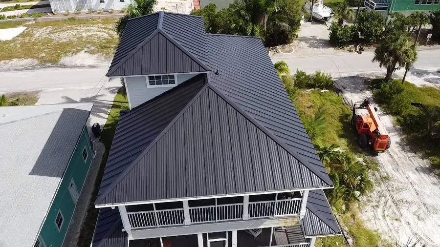 Charcoal standing seam metal roof residential home Southwest Florida
