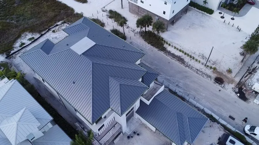 Standing seam metal roof installation Naples FL by Coastline Construction