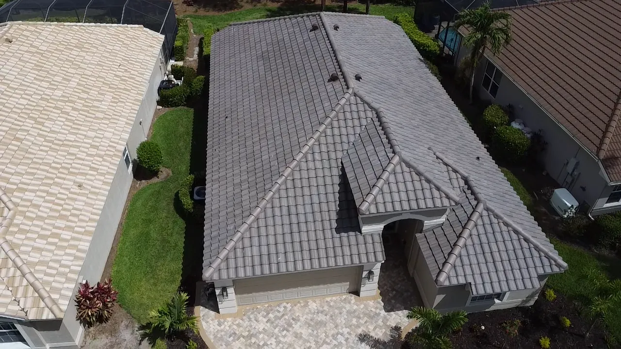 New concrete tile roof installation by Coastline Construction in Naples, FL